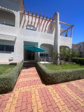Bungalow dans une résidence fermée
